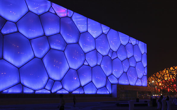 The media facade of Beijing's National Swimming Center is designed by Zheng Jianwei and one of a growing number of entirely Chinese media architecture project. Photo from www.water-cube.com